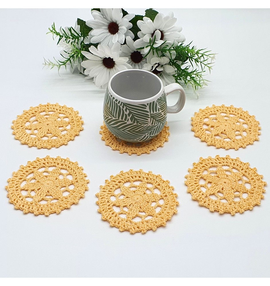 Szydełkowane żółte podkładki pod kubek